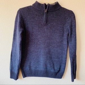 Blue boy sweater mock neck collar with zipper.